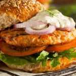 Salmon burger and tomatoes put everything in the sandwich and dinner will be served!